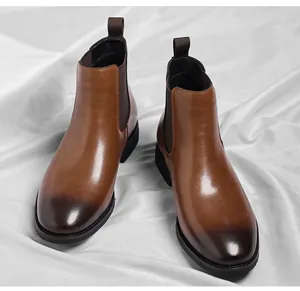 Full pair of men's brown leather Chelsea boots with a stylish dark gradient finish