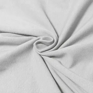 Macro view showing the soft and breathable texture of light gray pure cotton t-shirt fabric