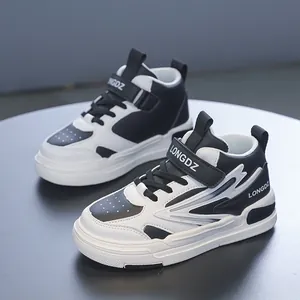 Baskets montantes noir et blanc pour enfants 6-12 ans avec tige en cuir synthétique durable