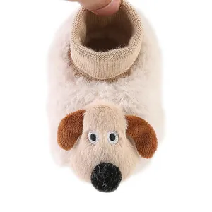 Detail view of plush baby winter slipper featuring a cute embroidered dog face design