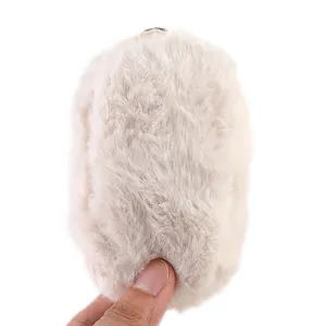 Detailed close-up showing the soft beige plush texture of baby winter floor socks