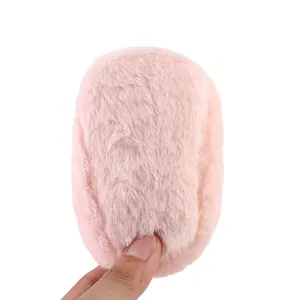 Macro view showing the soft pink plush texture of these warm winter baby walker booties