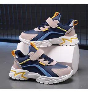 Elegantes zapatillas de running para niños azul y beige con velcro para deporte
