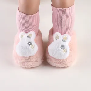 Cozy pink plush winter baby pre-walker slippers with adorable white bunny embroidery