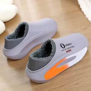 Waterproof grey winter clogs with warm fleece lining and orange accent