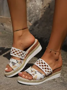 Elegant wedge sandals for women with butterfly print and white woven straps detail
