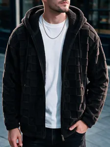 Detail view of men's winter hooded jacket with textured checkered fleece fabric.