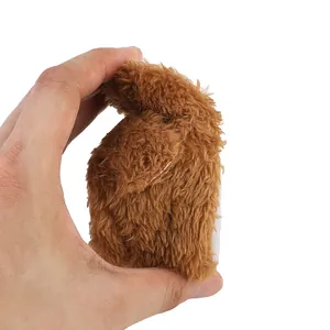 Close-up detail showing the soft brown plush texture of this winter baby shoe