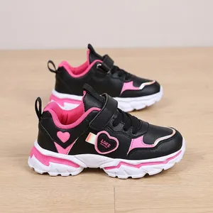 Lightweight girls sports running shoes in black and pink with heart pattern details