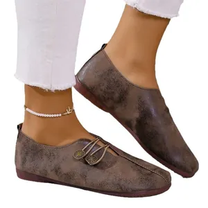 Women's vintage brown soft leather loafers with round toe and gum sole