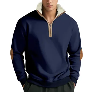 Detail view of navy blue half-zip sweatshirt with fleece collar and elbow patches