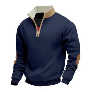 Detailed view of men's navy half-zip sweatshirt with vintage beige fleece collar lining.
