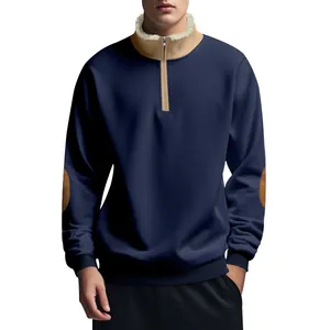 Detail view of navy men's half-zip sweatshirt with khaki fleece collar and elbow patches