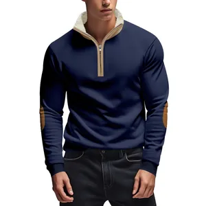 Detail showing the navy blue fabric, metal half-zip, and contrast fleece collar lining