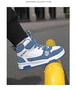 Baskets montantes pour enfants en cuir bleu et blanc avec bride velcro pratique