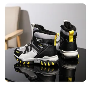 Side and rear view of warm children's snow boots with yellow accents and fleece lining