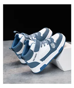 Baskets montantes bleu et blanc pour enfants avec fermeture velcro et détails de logo