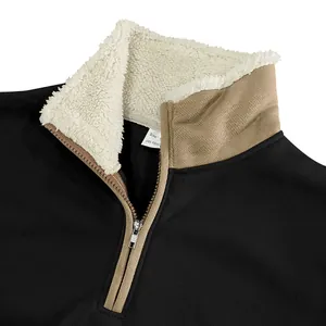 Detail view of men's quarter-zip sweatshirt showing fleece collar and metal zipper