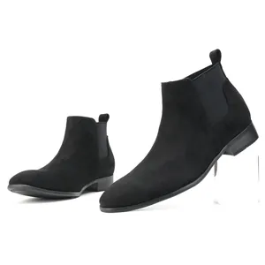 Detailed side view of black suede men's Chelsea boots with a modern square toe design.