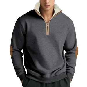 Close-up of men's quarter-zip sweatshirt with fleece collar and elbow patches