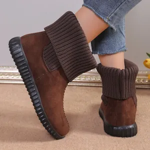 Women's brown suede winter snow boots featuring a chunky ribbed knit collar and flat rubber sole