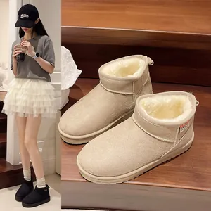 Detailed close-up of warm beige plush-lined winter boots showcased on interior wooden stairs