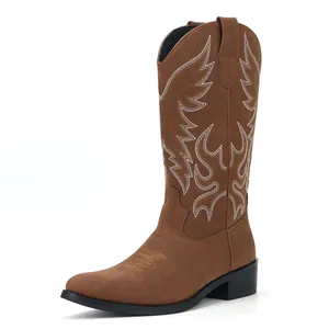 Classic brown men's western cowboy boots with intricate white embroidery on mid-calf shaft