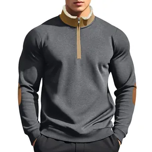 Detail of men's half-zip sweatshirt featuring fleece-lined collar and contrast elbow patches.