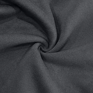 Close-up detail of high-quality dark grey twill fabric texture for men's sweatshirt