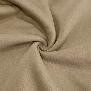 Close-up of premium khaki twill fabric texture for vintage American style sweatshirt