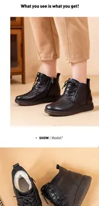 Vue détaillée de bottes en cuir noir pour femmes avec doublure en peluche chaude