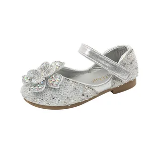Sparkling silver girl's princess Mary Jane shoes with large rhinestone flower detail