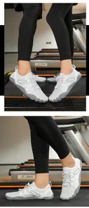White minimalist barefoot fitness shoes shown on a treadmill for gym and yoga workouts