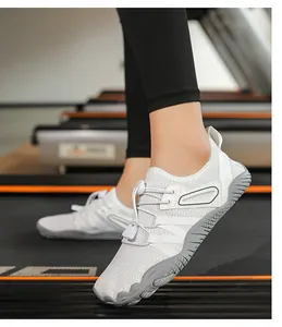 Detail view of breathable white wading shoes on a treadmill for fitness and yoga.