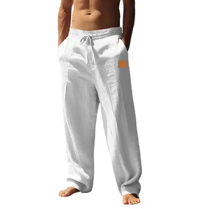 High-quality detail of men's loose white linen casual trousers with adjustable drawstring