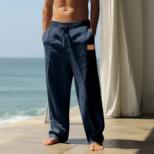 Detail of men's breathable loose fit linen casual pants in navy blue for summer