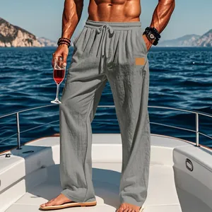 Leggeri pantaloni casual da uomo in cotone e lino grigio con coulisse per la spiaggia.