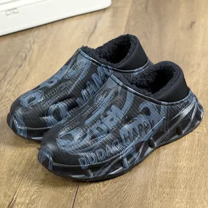 Detail view of black water-resistant outdoor clogs with plush fleece lining and print