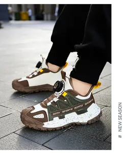 Close-up of boys' durable outdoor sports shoes with rotary buckle in autumn colors