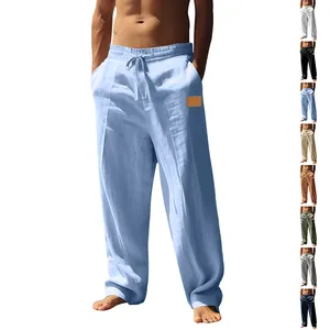 Men's loose linen casual trousers with drawstring waist and straight leg in light blue
