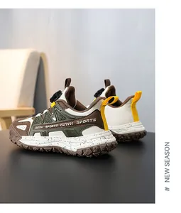 Detailed side view of kids' outdoor sneakers featuring a convenient rotary dial lacing system.