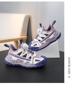 Detailed view of purple and white children's chunky sneakers with rotary dial laces