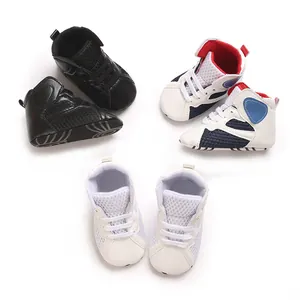 Three pairs of mid-top soft sole baby walker shoes in black white and blue colors