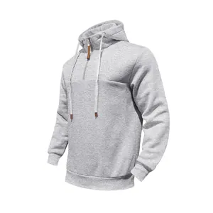 Gedetailleerde zijkant van een grijze zware fleece hoodie met korte ritssluiting