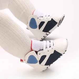 Comfortable white and blue mid-top soft sole baby walking shoes with mesh detail