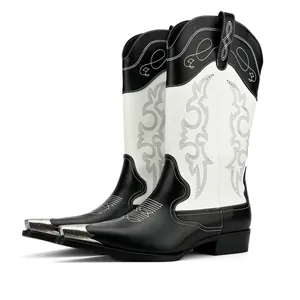 Detailweergave van retro heren westernlaarzen met borduursel en metalen neuskap