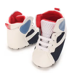 Close-up of baby high-top walking shoes with breathable mesh and red-blue-white color block