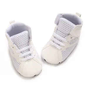 Detail view of white high-top baby walker shoes with breathable mesh and soft soles.