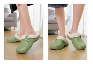 Detailansicht warmer grüner Winter-Clogs mit weißem Plüschfutter für den Innenbereich