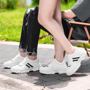 White platform sneakers for couples with black stripe detail for casual outdoor wear.